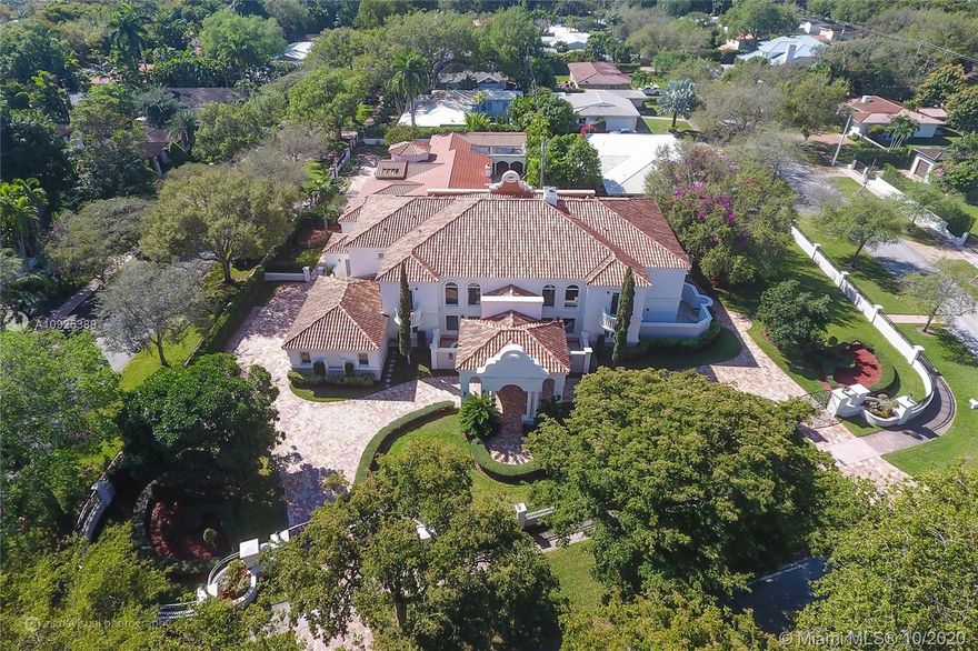 Absolutely stunning Estate in Coral Gables. Completely remodeled in 2017 with no expenses spared. Almost 8,000 adj sq ft with 6 suites, 1 office and #3 car garage. The best finishes possible: Eggersman Kitchen, Miele Appliances, marble & wood floors, Savant automation system, Ornare closets and more. Remarkable corner house, surrounded by 3 streets on 29,800 SF. Large Terrace surrounding beautiful pool area, with Jacuzzi, summer kitchen with BBQ and cabana bathroom. Manicured gardens complete this astonishing home.