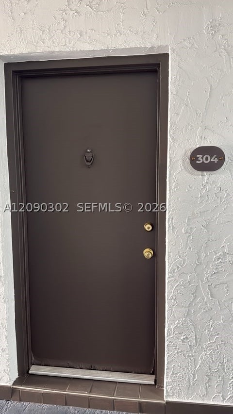 Photo of 5221 Geneva Way #304, Doral, FL 33166 (MLS # A12090302)