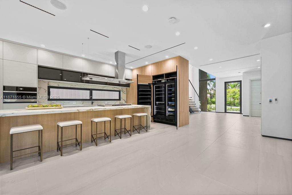 Just completed and officially ready to impress. Newly priced. Welcome to 618, where luxury meets lifestyle in the heart of Fort Lauderdale. This 4-bedroom, 4.5-bath stunner was built with zero shortcuts and loaded with upgrades from top to bottom. Step into a chef’s dream kitchen with custom cabinetry, designer countertops, and professional-grade appliances that make cooking a joy. Each bedroom is a private retreat with its own en-suite bath, while the primary suite takes it up a notch with spa-level finishes and oversized walk-ins. Clean modern lines, natural light, and flawless attention to detail make this home feel both sophisticated and inviting. In one of the city’s most desirable neighborhoods, this property delivers not just a home—but a lifestyle. And it’s ready right now.