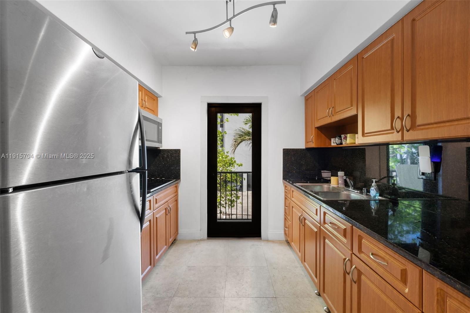 TUDOR HOUSE CONDO - Residential