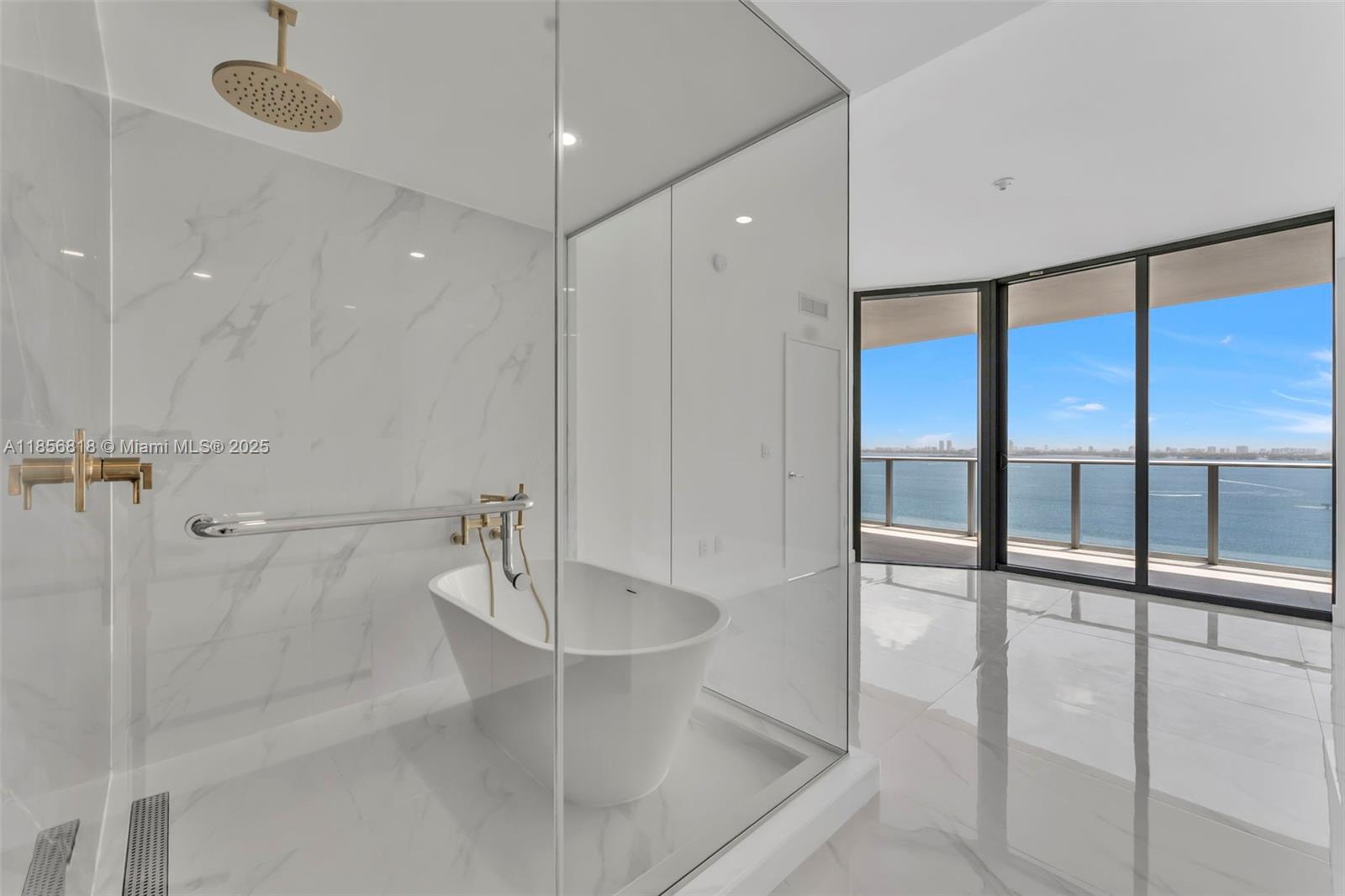 Unmatched luxury & views! This spectacular 2-Bed + Den, 3-Bath residence at Aria Reserve Miami offers unobstructed ocean & Miami Beach skyline vistas from every angle. Step off your private elevator & foyer into 1,542 sq ft of modern elegance, plus a 257 sq ft terrace perfect for sunrise coffee or sunset wine. Floor-to-ceiling glass, soaring ceilings, and a chef’s kitchen with premium appliances set the stage for sophisticated living. Enjoy 3 acres of luxury amenities: 3 pools (2 waterfront), private sports marina, spa, fitness center, padel & tennis courts, basketball court, mini golf, wine lounge, library, kids’ play areas, and more. All in a premier waterfront location, just minutes to the Design District, Midtown, Brickell & Miami Intl Airport. Live where the city meets the sea!