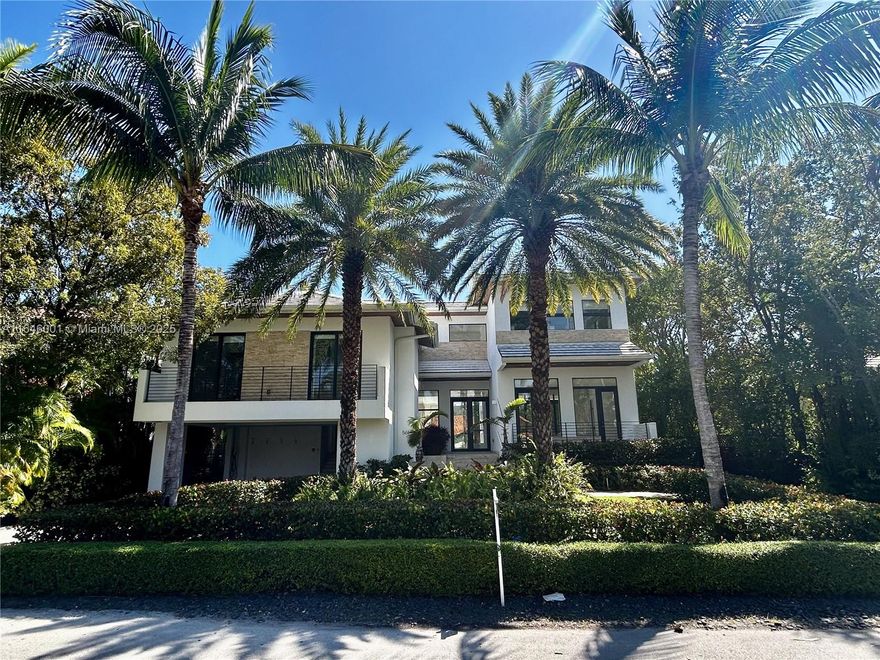 Own a piece of paradise in this three level, bright, open design, immaculate 6 bedroom, 6.5 bathroom home! Located centrally, on a quiet street on the desirable Island of Key Biscayne. A perfect family home ready for entertaining! Featuring extra high ceilings, top of the line finishes & appliances, all en-suite bedrooms with custom closets, spacious social areas, high-impact windows & doors throughout. Wide balconies and terraces overlooking the lush gardens and the heated pool & jacuzzi with their own waterfall. Covered 2 cars garage plus space for more! Electric car charger, 2 storage rooms. Black outs & shades in every room, all in pristine conditions & ready to move in! Walk to schools, parks, gym, shops, restaurants, the beach and more!