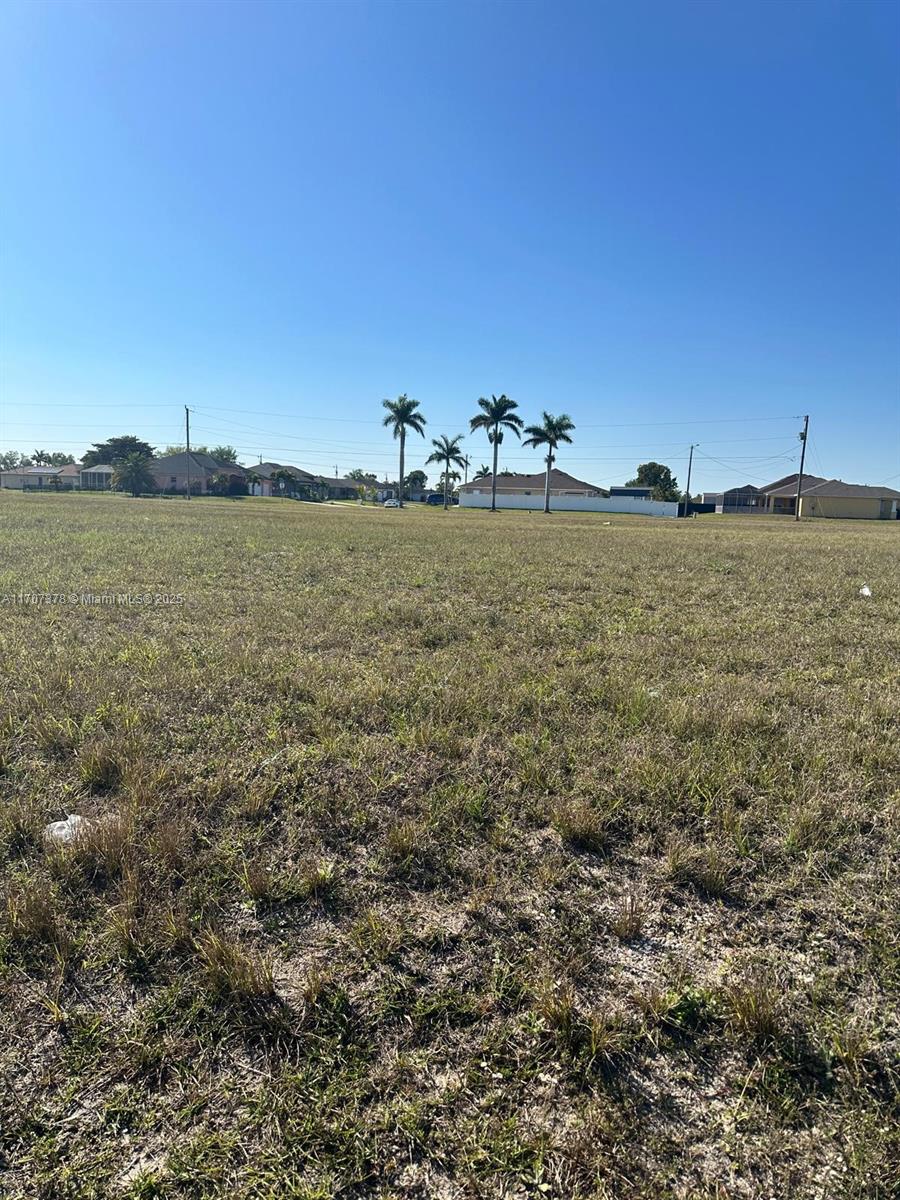 Builders and Investors Alert! Prime NE Cape Coral Opportunity - NO FLOOD ZONE! 608 Diplomat Parkway E, Cape Coral, FL, is a 0.417-acre commercial parcel (17,977 sq ft) with dimensions 117x134x136x156. Located in Flood Zone X, safely outside the 100- and 500-year floodplains. Just 1 block from Andalusia Boulevard and 1.15 miles from Del Prado Boulevard N, this property sits on Diplomat Parkway, a 4-lane divided roadway connecting Del Prado Boulevard to Burnt Store Road. Situated in the rapidly growing North Cape area, this is a rare and affordable opportunity to build in a high-demand location.
