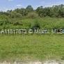 amazing lot with 1.25 acres in the Montura Ranch estate , bring your animals and family , welcome Mobil Homes manufactured homes.it is a rural Community of South Central Florida, in the city of Clewiston ,close to Miami ,Naples, Fort Myers, Cape Coral, fort Lauderdale, west palm beach, port charlotte and Okeechobee city. The Club house has a swimming pool park, playground, afterschool programs, summers camp for Kids make your offer don't be shy!!!!