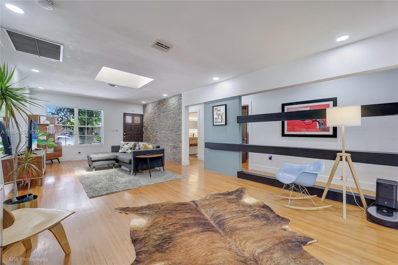 This stunning 3-bedroom, 2-bathroom home in the heart of Coral Gables offers an exceptional blend of modern comfort and timeless charm. Recently renovated with beautiful wooden floors throughout and both bathrooms newly remodeled, the open living area is bathed in natural light, thanks to the inviting skylight. The property includes a spacious garage and is perfectly situated just a short walk from iconic landmarks such as the Biltmore Hotel and the Alhambra Water Tower. Enjoy the vibrant Coral Gables lifestyle with easy access to renowned attractions, dining, and shopping, all while residing in a truly elegant and warm home. 2 percent to buyer's agent.