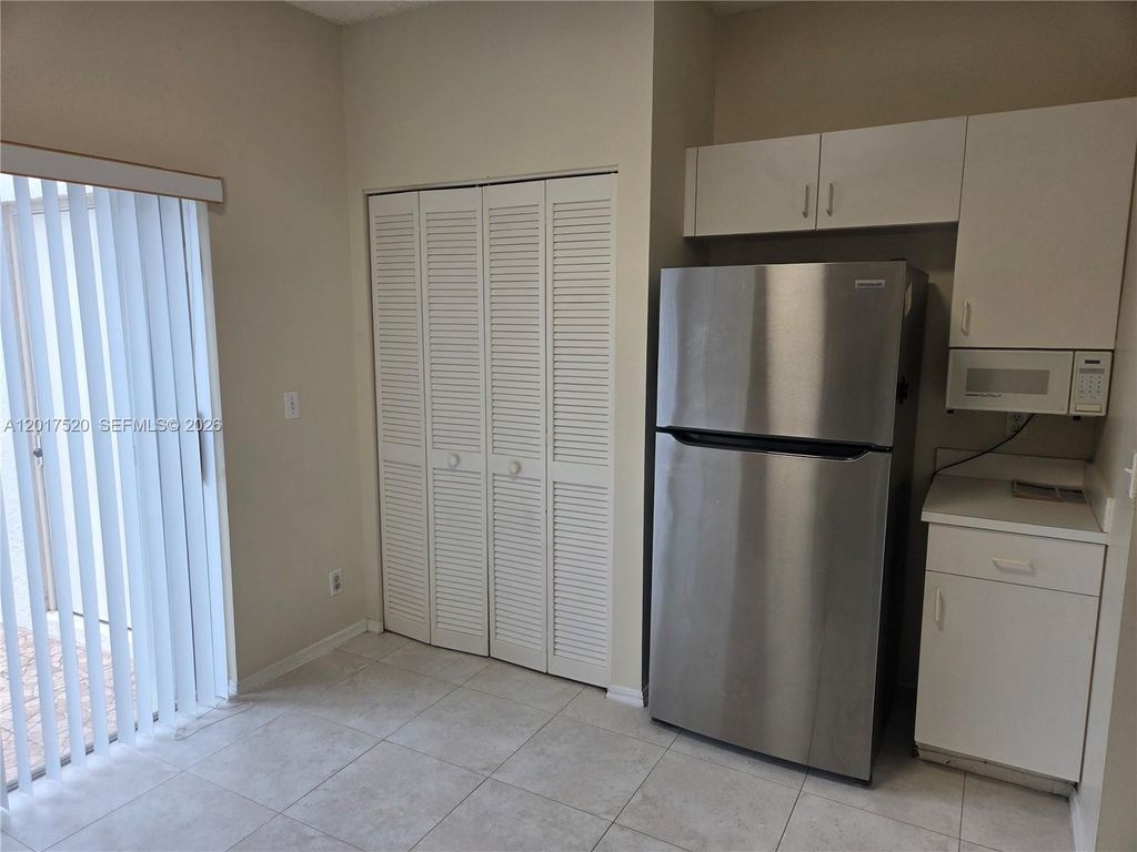 Photo of 47 Simonton Cir, Weston, FL 33326 (MLS # A12017520)