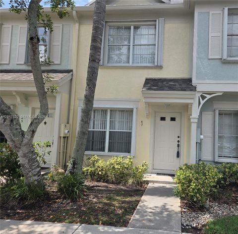 Photo of 47 Simonton Cir, Weston, FL 33326 (MLS # A12017520)