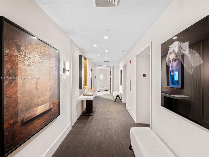 Indulge in unparalleled luxury with this fully rebuilt, corner-unit residence at the renowned Four Seasons. This is the most tastefully remodeled unit in the building, featuring 3 bedrooms, 4.5 baths, and 4,251 A/C sqft of exquisitely reimagined space. Boasting two private balconies, this home offers unobstructed views of Biscayne Bay, Miami Beach, and the Atlantic Ocean. A masterpiece of design, featuring custom millwork, a chef’s kitchen with high-end finishes, and a spa-inspired primary suite. The other two BRs are each meticulously designed w/en-suite baths. Smart home automation, motorized shades, and exclusive access to world-class amenities, including a resort-style pool, fitness center, and 24hour concierge, complete this exceptional offering. A truly exceptional living experience.