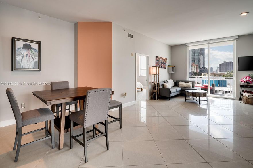 Bright and spacious corner unit in the heart of Edgewater. Enjoy beautiful sunsets and city views from the main balcony overlooking Biscayne Blvd. 1,280 sq.ft., open floor plan, tiled floors, 10ft. ceilings, high impact windows/doors, ample kitchen with stainless steel appliances, pantry, breakfast area, and independent balcony. Master bedroom with walk-in closet, roller shades and blackouts in both bedrooms, and washer/dryer in the unit. Uptown Lofts is a centrally located, boutique building near Midtown, Wynwood, Downtown Miami, with easy access to main highways and public transportation. Tenant occupied unit.