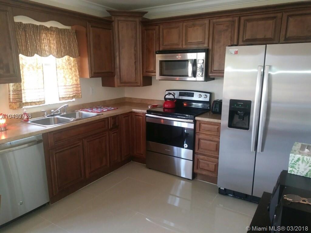 WILL NOT LAST!!! BEAUTIFULLY REMODELED 3/2 HOME WITH CARPORT; FEATURING NEW TILE FLOORING THROUGHOUT; RARE WATERFRONT; OCEAN ACCESS WITH BRIDGES; LARGE UTILITY/LAUNDRY ROOM
INSIDE. NEARBY SHOPPING, MAJOR ROADS, PUBLIC TRANSPORTATION, BEACHES. SO GOOD, THIS
PRECIOUS GEM WON'T LAST LONG! SCHEDULE NOW TO SEE THIS ONE OF A KIND PROPERTY!!