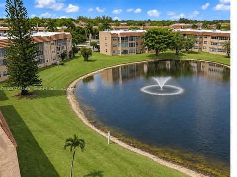 Photo of 9850 Sunrise Lakes Blvd #108, Sunrise, FL 33322 (MLS # A12104035)