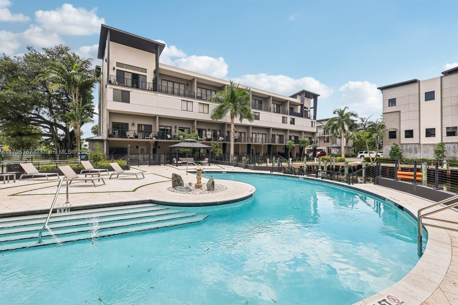 Discover this 3-bed, 3.5-bath, 3-story townhome in the private coastal paradise community of KOI RESIDENCES AND MARINA.This modern home combines comfort and convenience in a prime location.
1ST floor, you'll find one bedroom with a full bathroom. The heart of the home is on the second floor, featuring an open-concept kitchen, dining area, living room, and a half bathroom. The 3RD floor has a master en-suite bedroom and a en-suite guest bedroom, each with a private balcony perfect for relaxing while enjoying the coastal view. PRIVATE MARINA residents only of KOI. Minutes from beaches, restaurants, and gyms. Gated community offers an array of amenities, including a clubhouse, modern gym, billiard, infinity pool and PRIVATE GATED DOG PARK.