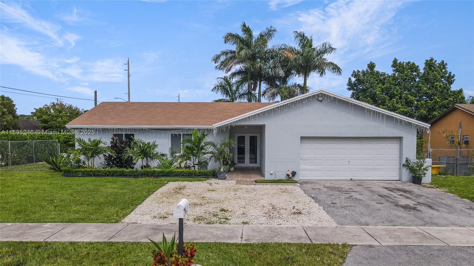 Spacious 4-bedroom, 2-bath home on a massive 8,800 sq. ft. corner lot. Fully remodeled in 2023, this property boasts a new roof, impact windows, an updated kitchen with quartz countertops, and a fresh modern design — truly move-in ready. Enjoy bright, open living spaces, a two-car garage, and ample driveway parking — plus a huge backyard with plenty of room for your boat, RV, or more. Nestled in a quiet, family-friendly neighborhood close to schools, parks, and major highways, this home offers the perfect blend of space, style, and convenience.