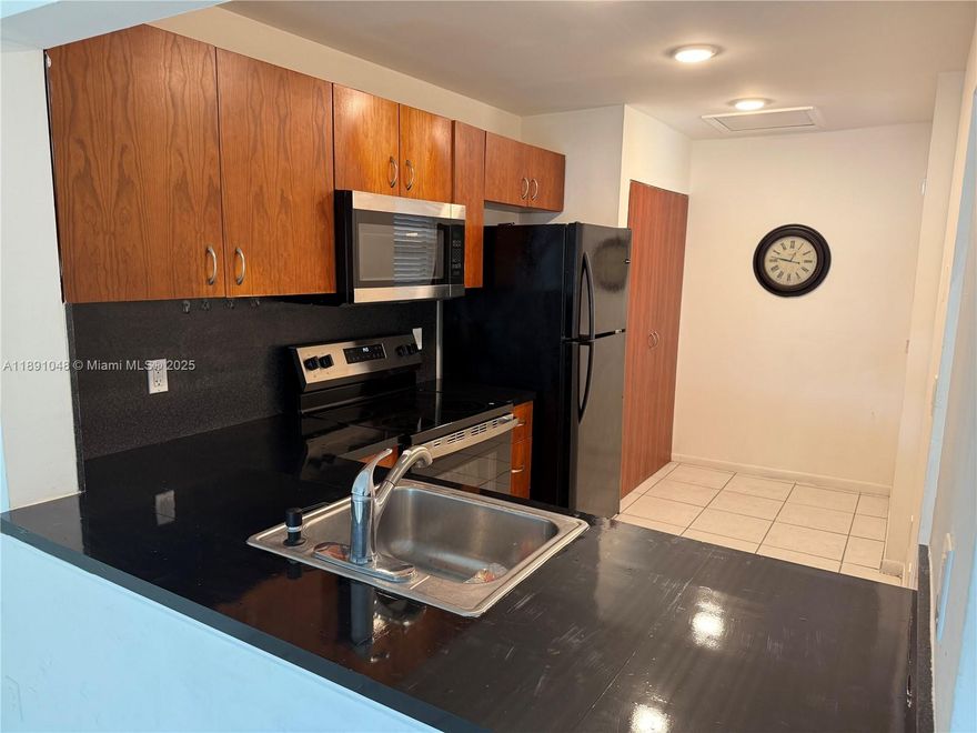 Charming, spacious and bright 2/2 condo in a gated community. Conveniently located near I-95, US-1, Aventura Mall and the beach. The unit features tile floors throughout, a functional space kitchen with new dishwasher, new range oven, brand new washer dryer in unit, screened in patio to enjoy your morning cup of coffee from. Main bedroom includes an ensuite bathroom and walk in closet. This corner unit condo is both practical and inviting. Don't miss out!