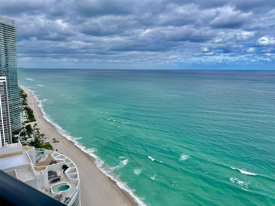 Exceptional in every aspect, this unit is a masterpiece of luxury living with direct ocean frontage. Boasting 4 bedrooms, 3.5 bath, along with a service room with its own bath, plus a versatile Den/Family room.This residence offers a wealth of space for your comfort & convenience with its own private elevator.Step onto the terrace & discover a private pool and summer kitchen, great for relaxation and entertainment. This extraordinary unit goes beyond the ordinary, featuring a private garage & a state-of-the-art robotic car elevator. The amenities are nothing short of 5-star, including a fully-equipped gym, a serene spa, personalized beach service, a private restaurant, theater, virtual golf game, a race car simulator for enthusiasts, and a lounge bar & coffee area for moments of leisure.