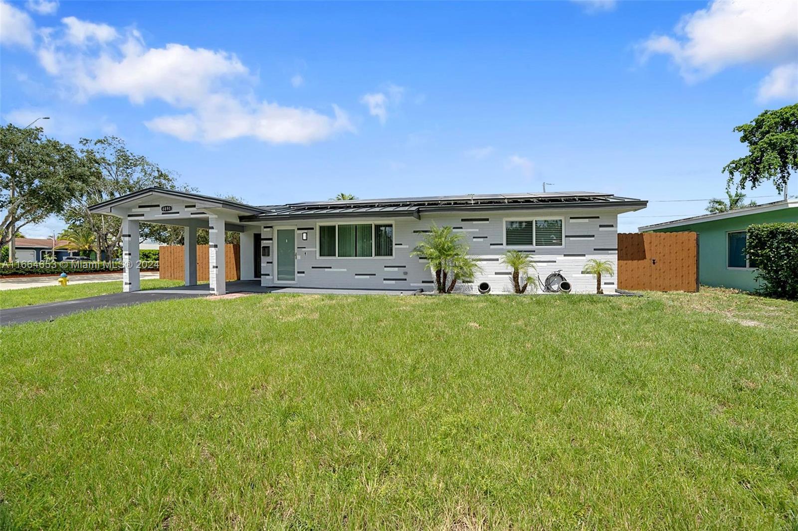 Heart of the City, perfect location to all major highways, shopping and schools. This BEAUTIFUL 2/1 could be 3/1 with large bonus room owner used as oversized PRIMARY could be family living space also. IMPACT WINDOWS & DOORS / SOLAR ENERGY EFFICIENCY / COVERED PATIO with OVERSIZED BACK YARD (SPACE FOR RV or BOAT). Home includes large open floor plan living, dining and kitchen with stainless steel appliances and NEW granite counter-tops. Bathroom freshly updated, utility laundry combo with full size front load washer & dryer, tile throughout home, large manicured privacy fenced yard. PETS welcomed with non-refundable deposit of $250 must have up to date vaccinations and insurance coverage on rental policy.