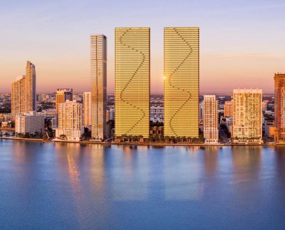 Welcome home to Aria Reserve–48th Floor Sky Residence. Imagine waking up each day surrounded by endless views of Biscayne Bay, Miami Beach, and the Atlantic Ocean, framed by floor-to-ceiling glass that fills your home with light. This 3 bed+den,3.5 bath residence blends comfort and sophistication with a private elevator foyer.
Designed to make life effortless, it features automatic blinds in the living room and master, dimmable lighting for every mood, a smart toilet in the master bath, and custom built-in closets ready to organize your lifestyle. Low HOA.
Here, every day feels like a retreat with over 2 acres of resort-style amenities.
Nestled in vibrant Edgewater, just minutes from Wynwood,Design District,Brickell and Miami Beach. Welcome to the place you’ve been waiting to call home.