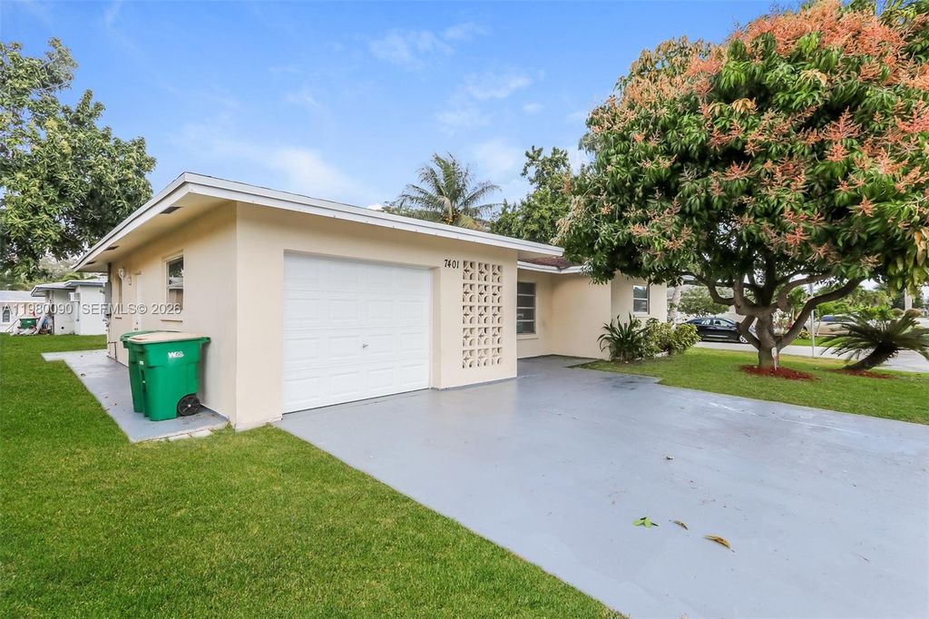 Photo of 7401 NW 58th St, Tamarac, FL 33321 (MLS # A11980090)