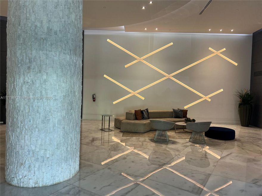 Originally a 1-bed + den, this bright and spacious unit has been thoughtfully converted into a true 2-bed, 2-bath apt. Pool views and natural light throughout. Unit features vinyl flooring, stainless steel appliances, granite countertops. Closet space, in-unit washer and dryer, 1 assigned covered parking, Add parking available for a monthly fee. Building with resort-style amenities: 2 swimming pools (one indoor facing a cozy coffee shop, one outdoor with a picnic/play area), Heated pool, sauna, hot tub, and updated fitness centers, renovated lobby with 24/7 concierge & valet service. Business center, club room, mini market, sand volleyball court, and playground. Just steps from Aventura Mall and minutes from Sunny Isles Beach, top-rated schools, grocery stores and golf courses.