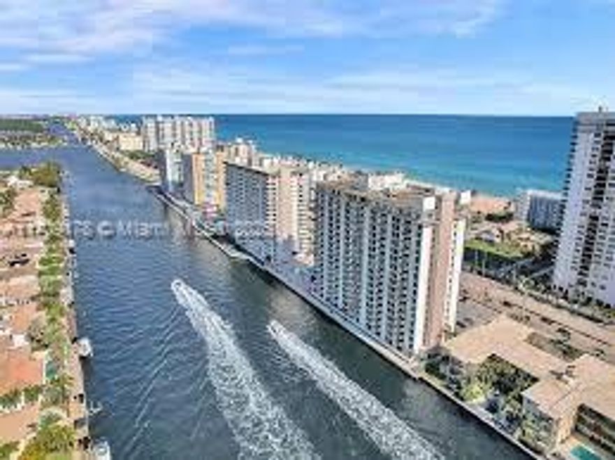 You’ll love this rare and beautiful, completely remodeled corner condo with Amazing Views. Watch the boats go down the Intracoastal or the sunrise over the Atlantic Ocean from this Exquisite and large Move in Ready Condo. The remodeled open kitchen and high end finishes in the bathrooms are gorgeous. Newly Renovated Building with Amenities such as: Heated Pool, Sauna, Gym, Billiard Room, Conference Room, the list goes on and on. New Pool Deck along with a Remodeled Lobby. Just steps to the Beautiful Hollywood Beach. Building passed 40 Yr Inspection 2016. Enjoy Beach Lifestyle, Hollywood Boardwalk, Shopping, Restaurants, Casinos and Margaritaville. Short drives to Ft Lauderdale or South Beach.
