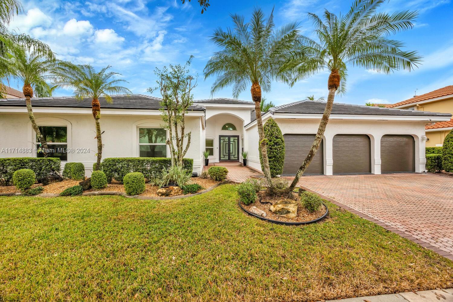 Exquisite lakefront home in the exclusive, gated Sunset Isles community, featuring just 39 residences. This spacious 1-story, split-floor plan offers oversized rooms & abundant natural light throughout, with panoramic lake views from nearly every room. The home boasts soaring ceilings and a gourmet kitchen w/ granite countertops and a premium s/s Subzero fridge. Recent updates include new porcelain tile, impact windows/doors, new roof, & hurricane-rated garage doors. The master suite features 180-degree lake views, creating a serene retreat. Additional highlights include a 3-car a/c'd garage, separate laundry room, & 2 A/C zones. Relax by the heated pool or explore the many Parks & Rec areas within Silver Lakes. Just minutes from top-rated schools, I-75, TPK & The Shops at Pembroke Gardens