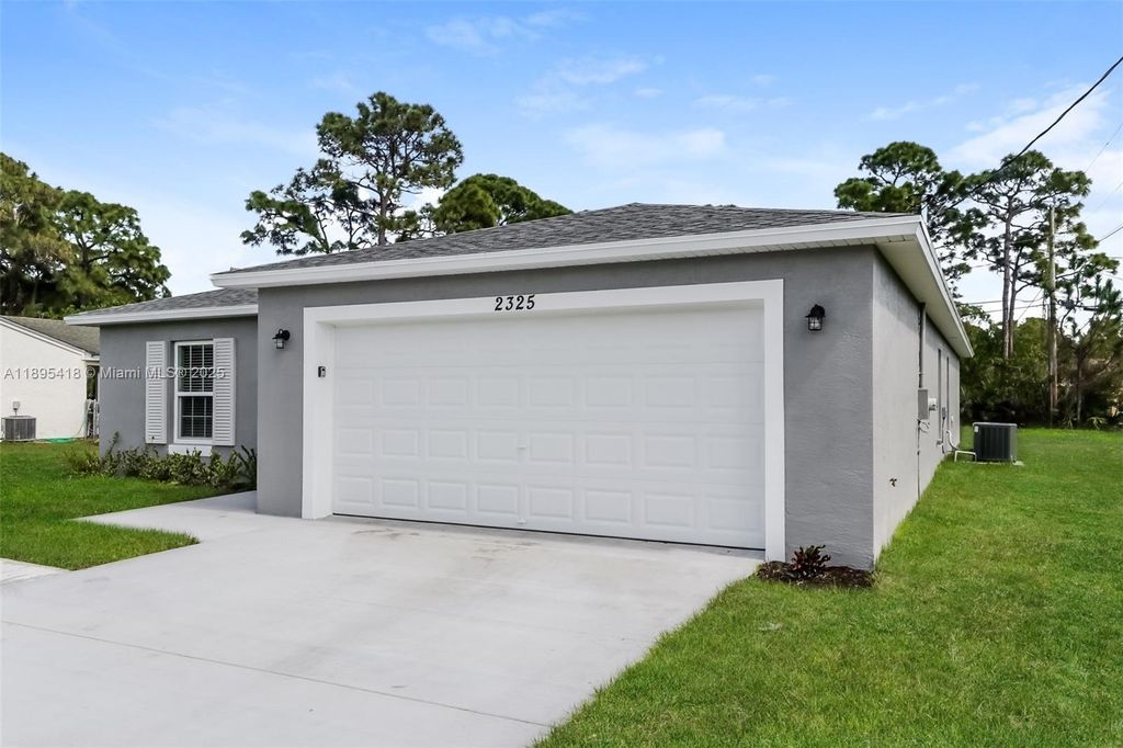 Photo of 2325 SE Berkshire Blvd, Port St Lucie, FL 34952 (MLS # A11895418)
