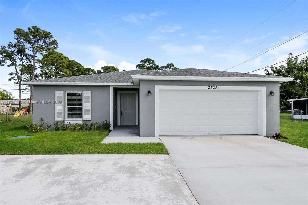 Photo of 2325 SE Berkshire Blvd, Port St Lucie, FL 34952 (MLS # A11895418)