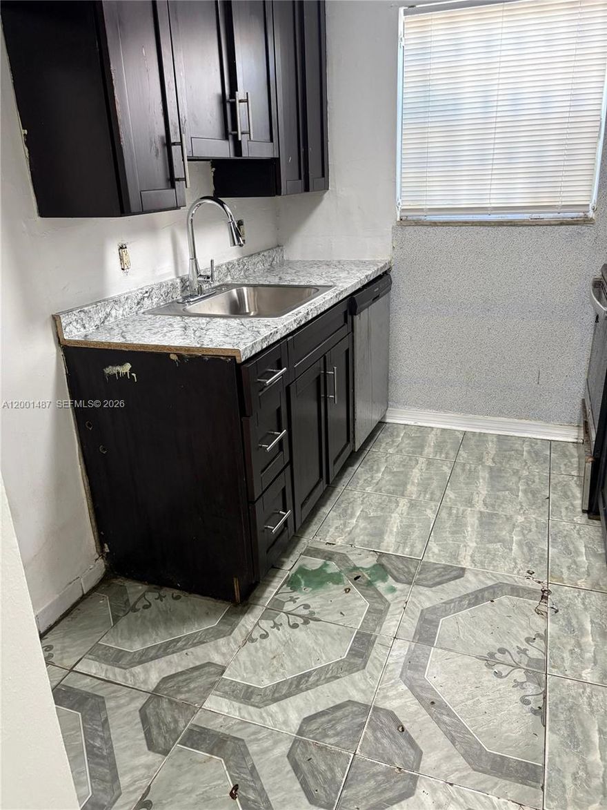 RECENTLY REMODELED TOWNHOUSE IN THE HEART OF NORTH MIAMI WITH NEW APPLIANCES FRESHLY PAINTED AND MORE COME SEE TODAY.