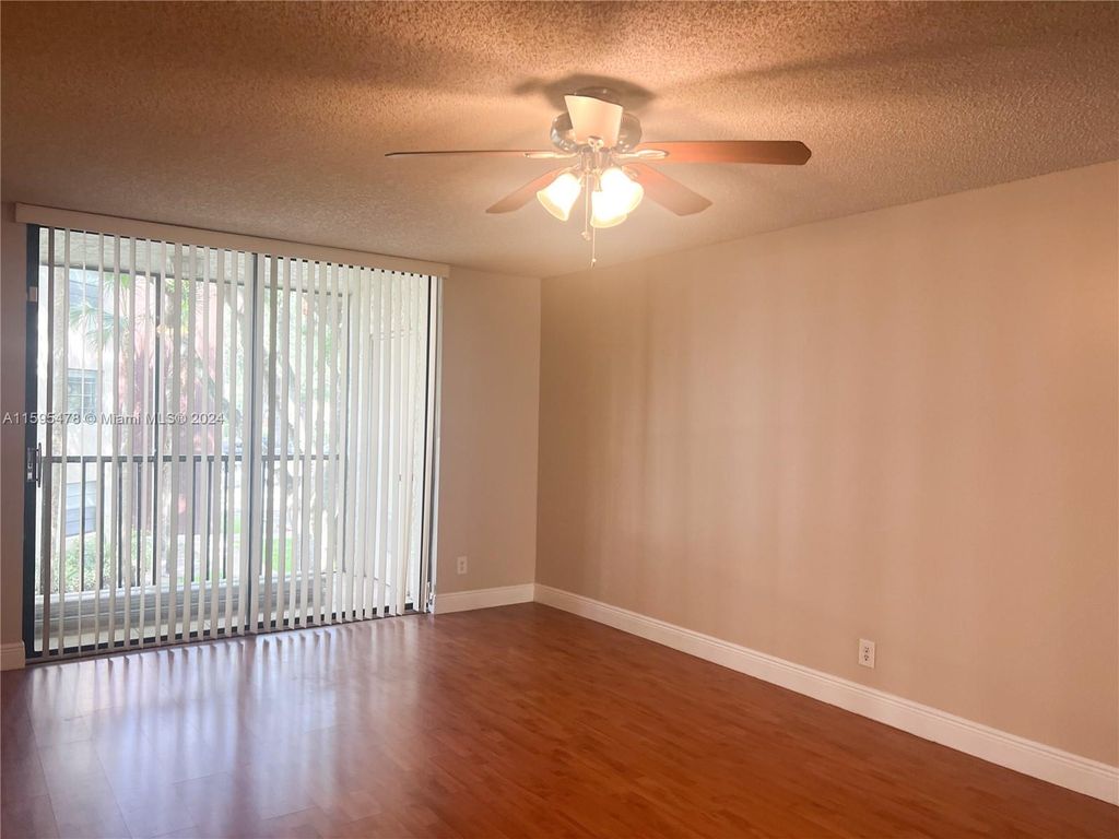 Photo of 10451 W Broward Blvd #210, Plantation, FL 33324 (MLS # A11595478)