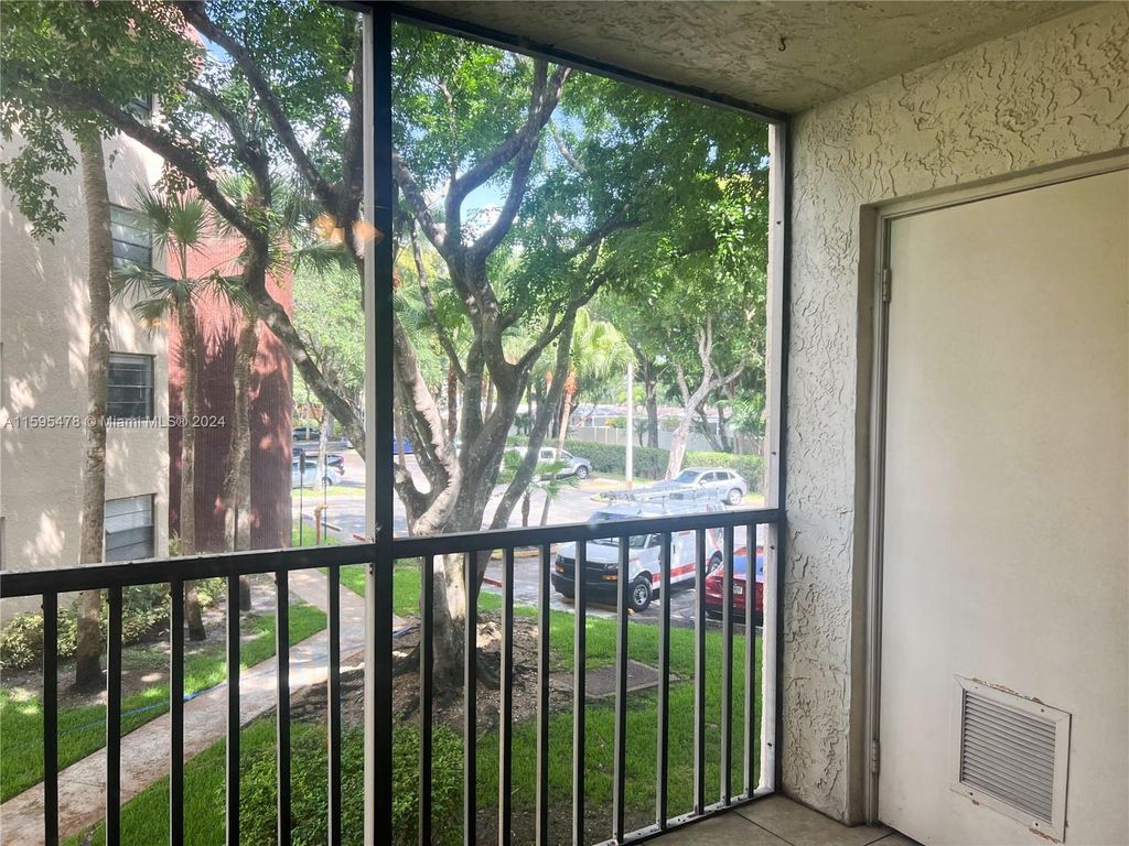 Photo of 10451 W Broward Blvd #210, Plantation, FL 33324 (MLS # A11595478)