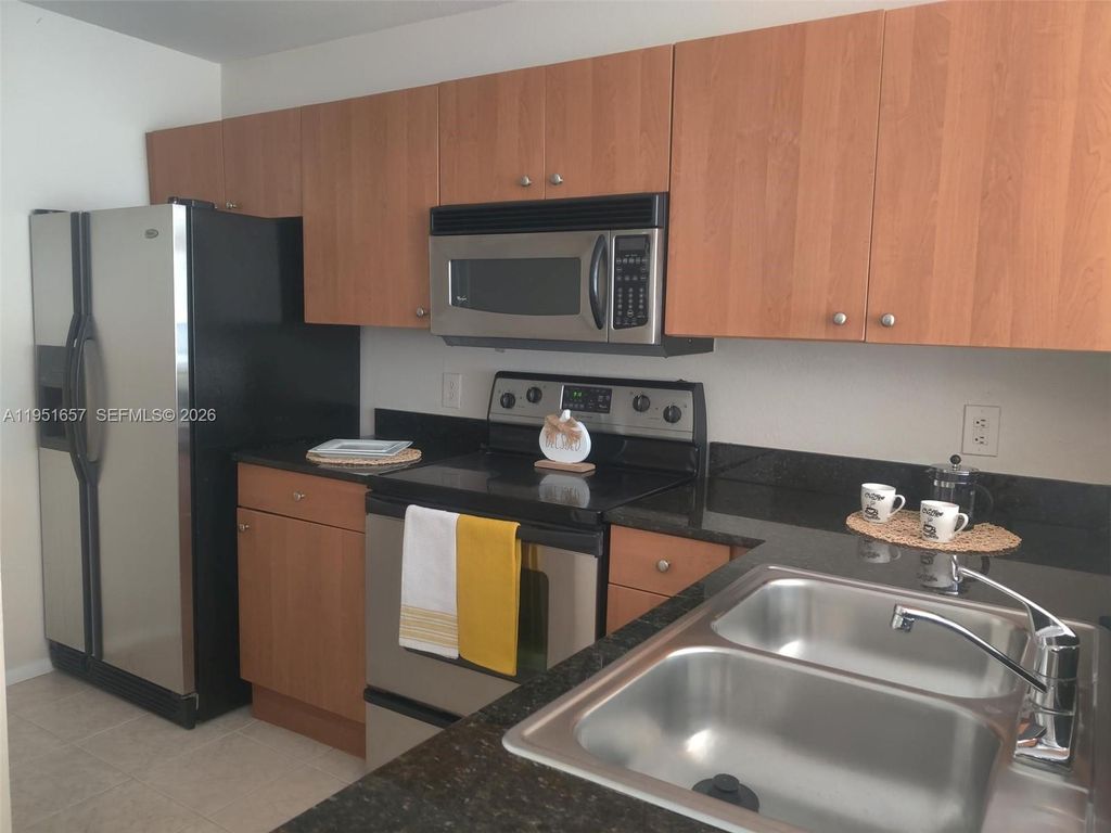 Photo of 1865 Palm Cove Blvd #9-305, Delray Beach, FL 33445 (MLS # A11951657)