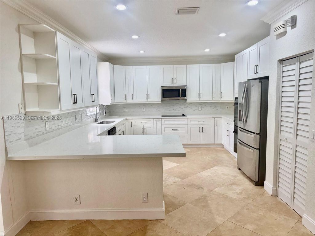 Photo of 2455 Greenbrier Ct, Weston, FL 33327 (MLS # A11969529)