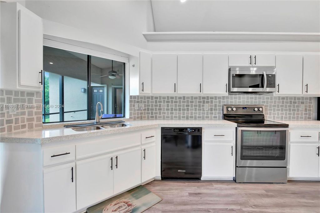 Photo of 710 Bluebird Ln, Plantation, FL 33324 (MLS # A11698121)