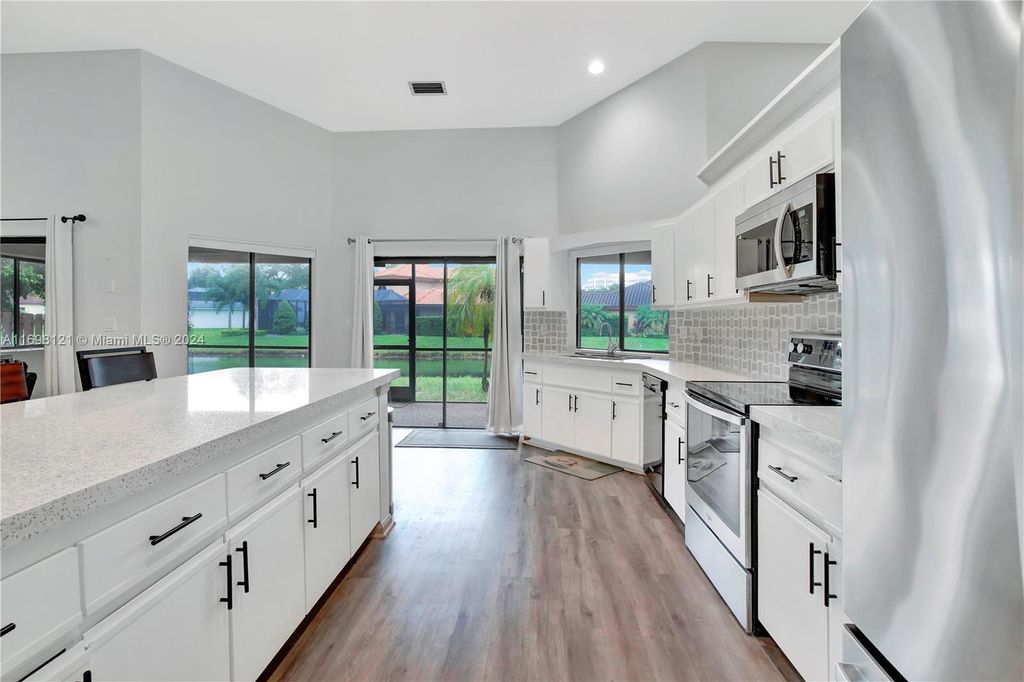 Photo of 710 Bluebird Ln, Plantation, FL 33324 (MLS # A11698121)