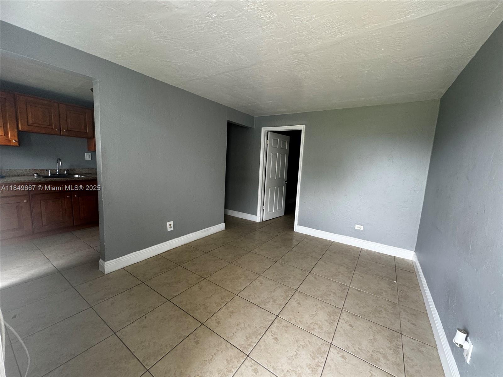 Step into this freshly updated 2-bedroom, 1-bath apartment located in a quiet West Park neighborhood. Featuring all-tile flooring, fresh paint, and a newly renovated bathroom, this unit offers clean, low-maintenance living with modern touches. Enjoy the convenience of included utilities—water, sewer, and trash—leaving only electric in your name. With easy access to I-95, shopping, and dining, this centrally located unit is ideal for those seeking comfort, value, and simplicity. Ready for immediate move-in—schedule your tour today!