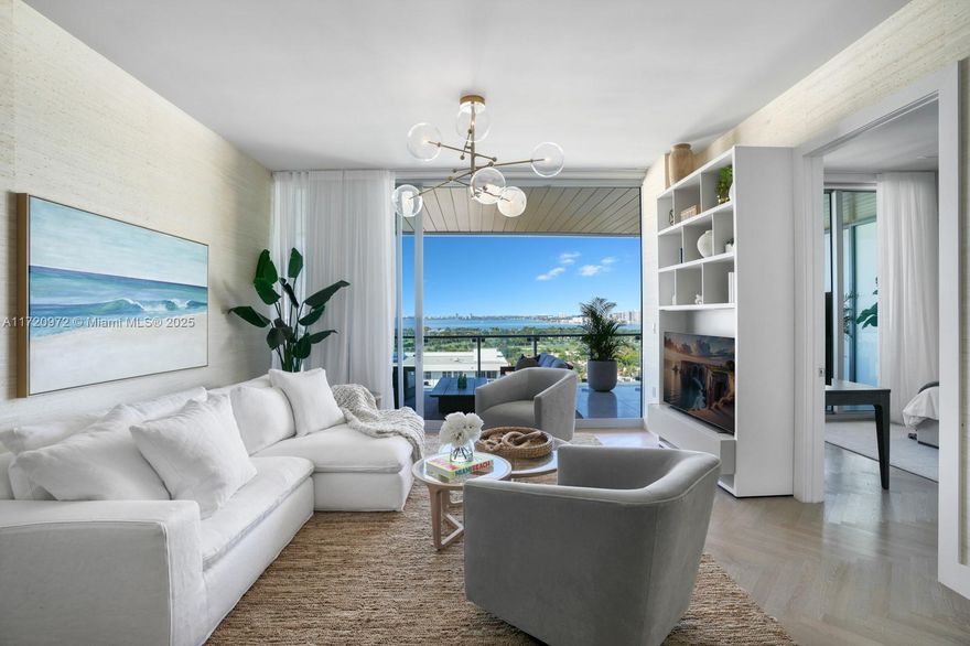 Step inside with me! This magnificent, high-floor residence showcases unobstructed views of downtown Miami's skyline and Biscayne Bay. The impeccably designed living space is bathed in natural light from soaring floor-to-ceiling windows. The thoughtful floor plan features a chef's kitchen w/ Subzero/Wolf appliances. Luxurious Poliform finishes grace both kitchen and bathrooms, while custom closets and refined millwork elevate the sophistication throughout. A sprawling 500SF terrace offers an outdoor oasis where sunsets and bay views captivate year-round. This exceptional offering uniquely includes 2 parking spaces. With only 69 units, 57 Ocean delivers an intimate living experience enhanced by world-class amenities: concierge, fitness facilities, restaurant, spa, beach service, and 3 pools