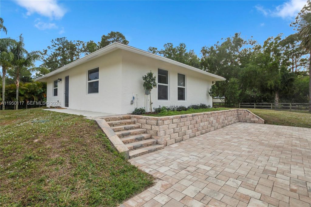 Photo of 12090 N 164th Ct #cottage, Jupiter, FL 33478 (MLS # A11950117)