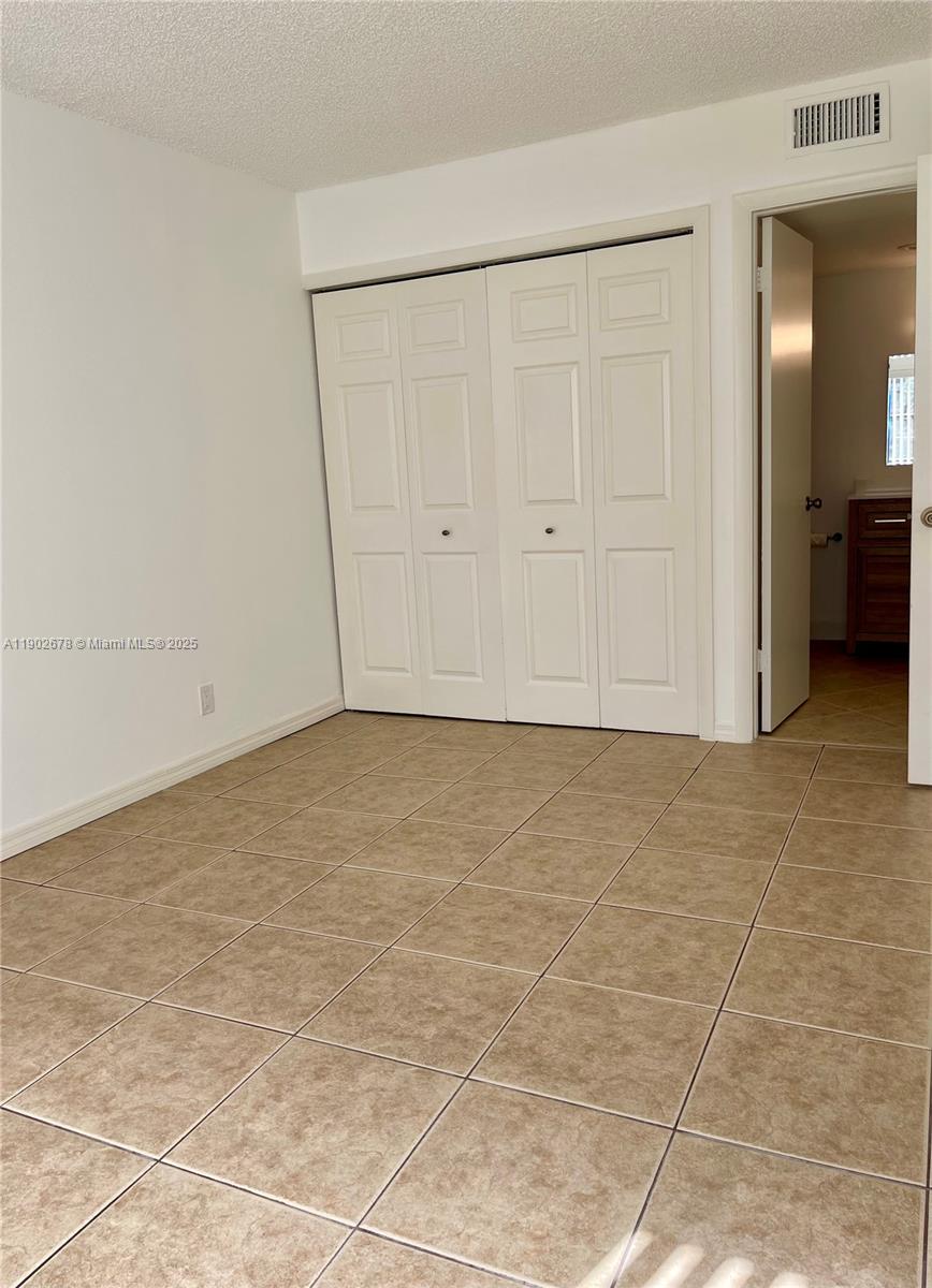 BUILDING SIX OF RACQUET C - Residential Lease