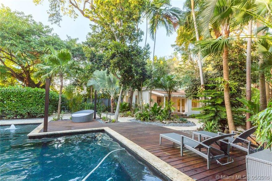 A paradisiacal retreat enclave on a double lot located in the center of the big City of Miami: The Roads, East I-95. This property, immersed in a lush and dense landscape, is conformed by two living units: A unique 1937 updated charm and cozy house and a modern guest. It features 3 bedrooms and 2.5 baths on 13,750 sq ft lot. Enjoy the needed privacy in today's world by the pool while at the same time being able to indulge in the active life the neighborhood offers.