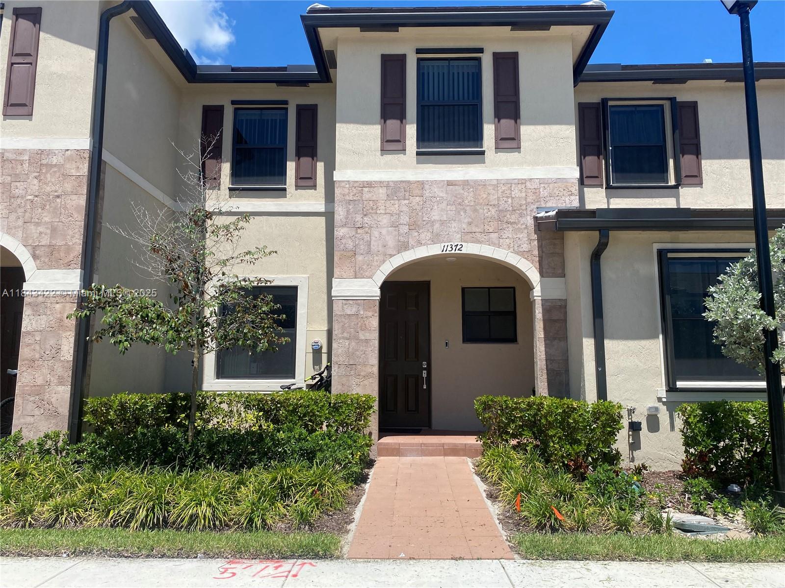 Welcome to this stunning 3-bedroom, 2.5-bath townhouse built in 2022, located in one of Miami’s most desirable and central areas! Enjoy a spacious open layout, sleek modern kitchen, and a private backyard with no rear neighbors, perfect for relaxing or entertaining. Nestled in a gated community with a resort-style pool, a fully equipped gym, a kids' playground, and more! Conveniently located near top schools, shopping, and major highways. Don’t miss out on this beautiful home! Easy to show!
