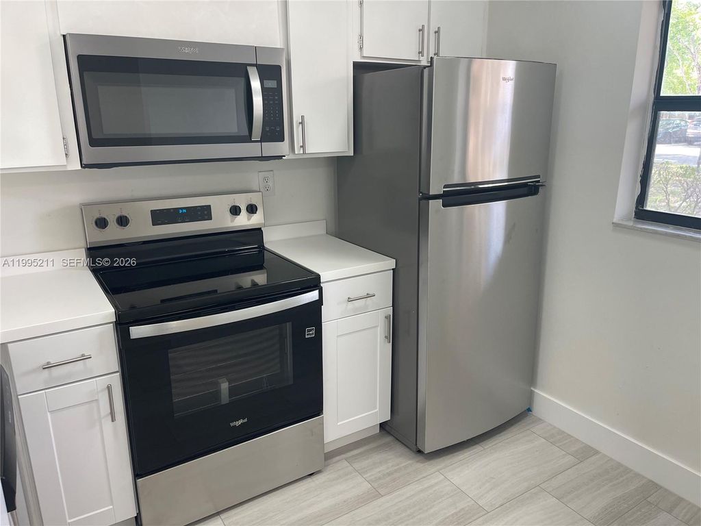 Photo of 3199 Foxcroft Rd #110, Miramar, FL 33025 (MLS # A11995211)