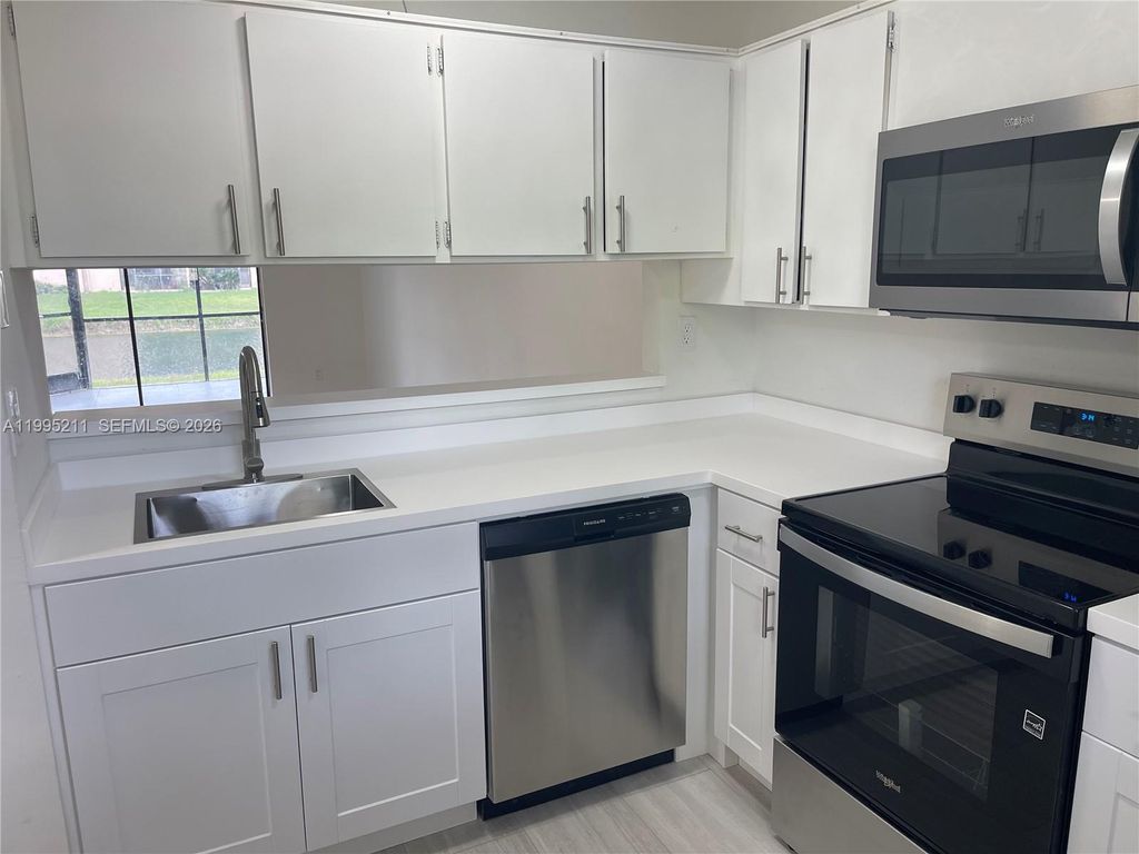 Photo of 3199 Foxcroft Rd #110, Miramar, FL 33025 (MLS # A11995211)