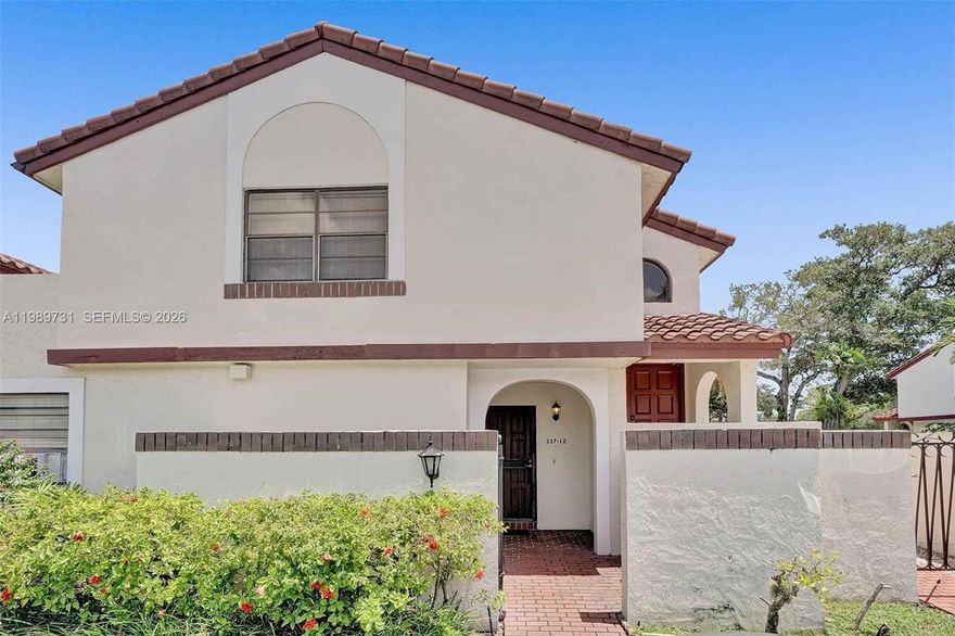 Exceptionally spacious one-level 2 bed / 2 bath with 1,715 sq ft of living area. A true split floor plan, where each bedroom is positioned on opposite sides of the unit, separated by the main living areas. This layout provides a high level of privacy, making it ideal for guests, in laws or roommates. Offering 1,715 sq ft of interior space, the layout includes a large living area that can easily accommodate a home office or additional seating, along with a laundry room and additional storage in the patio for added convenience. This is corner unit with abundant natural light throughout and a very large private patio, creating a strong indoor-outdoor feel and adding significant usable space. Property requires updates, including AC replacement and is priced accordingly. Conveniently located, just 4 miles from Aventura Mall and 3 miles from Hard Rock Stadium. Sold As is. Buyer to verify all information. Parking allows 2 cars per unit.