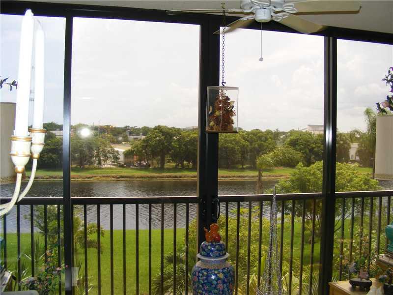 OPEN FLOOR PLAN WITH BALCONY OVERLOOKING THE CANAL FEATURING IMPACT GLASS SLIDERS FOR EXTENDED LIVING SPACE. LARGE MASTER WITH 2 WALK IN CLOSETS, EXTRA STORAGE OUTSIDE, WASHER & DRYER IN UNIT. GREAT AMENITIES SUCH AS CLUBHOUSE, POOL, GYM, SPA, TENNIS. CEN TRALLY LOCATED. NO RENTALS ALLOWED FIRST 2 YEARS OF OWNERSHIP.