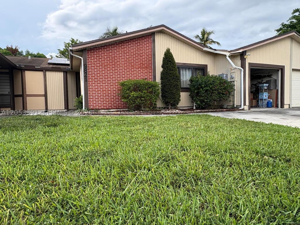 Photo of 9821 W Elm Ln #9821, Miramar, FL 33025 (MLS # A12053391)