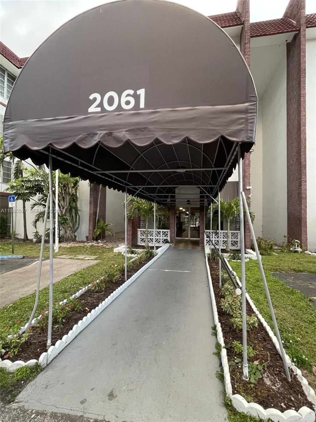 Photo of 2061 NW 47th Ter #306, Lauderhill, FL 33313 (MLS # A11985597)