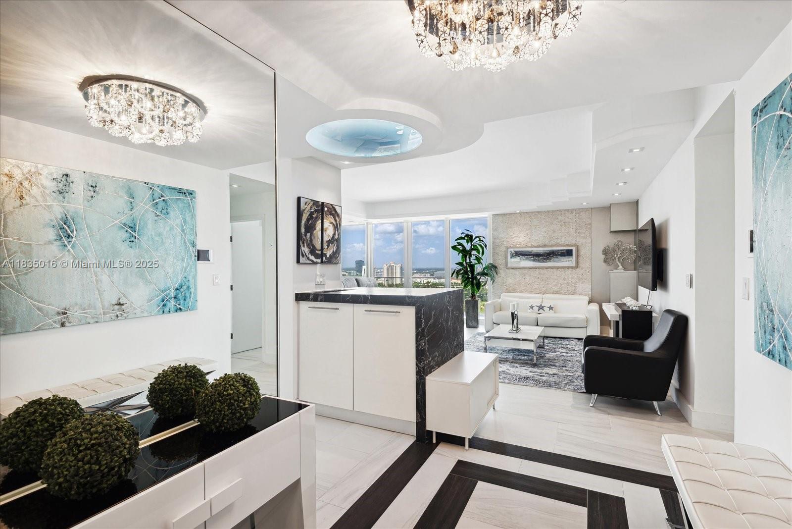 Great opportunity! One-of-a kind fabulous 1887 Sq. Ft. Penthouse totally upgraded and remodeled in luxurious Turnberry North Tower. Stunning white porcelain floors throughout! Top of the line appliances! Open kitchen! Hurricane proof windows & doors! Huge oversized glass balcony wraps around the entire unit. 10 Ft. ceilings. Spectacular city & ocean views! Electric Shades! Steam room in master shower! Open concept master closet! Very spacious unit perfect for entertaining and enjoying to the maximum the Florida lifestyle! Resort living in your own backyard! Amenities include heated pool w/pool service, jacuzzi, restaurant, theater room, bicycle storage, card and party rooms, pool room, children's playroom, free water aerobic, Zumba and yoga classes, 24 hr. security & valet.