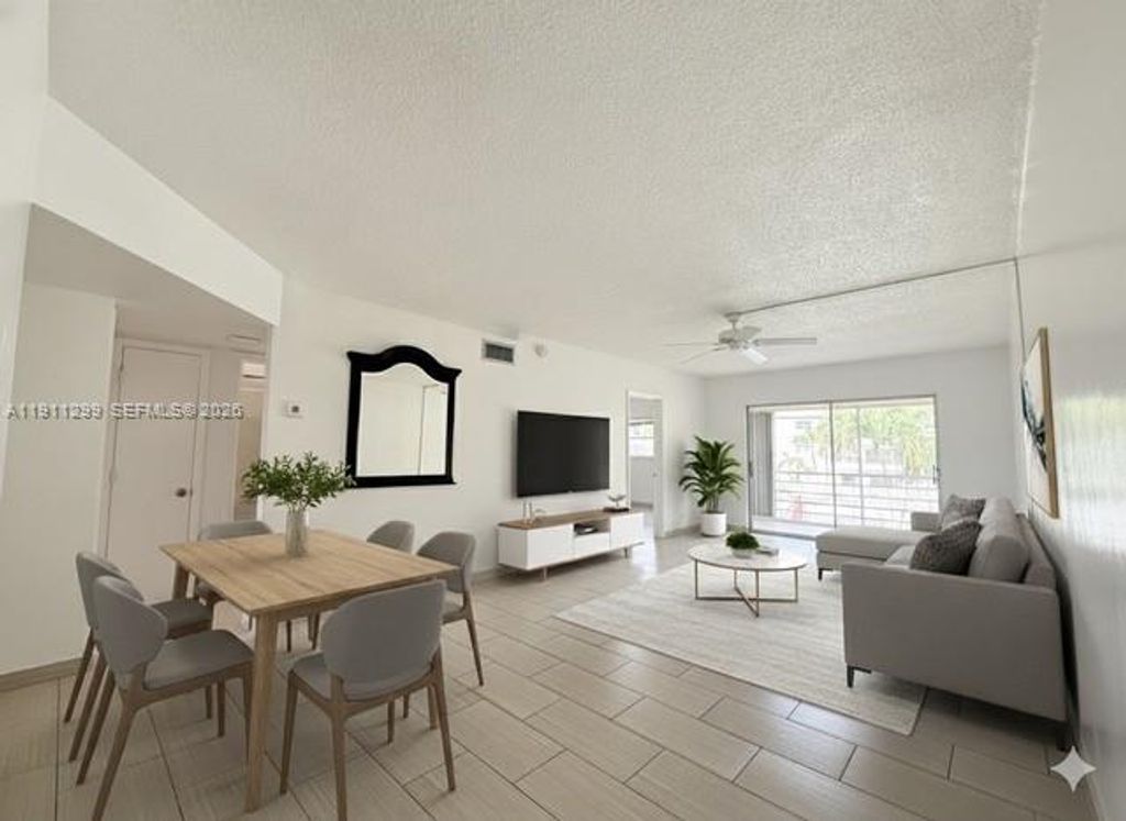 Photo of 4200 Crystal Lake Dr #214, Deerfield Beach, FL 33064 (MLS # A11911299)