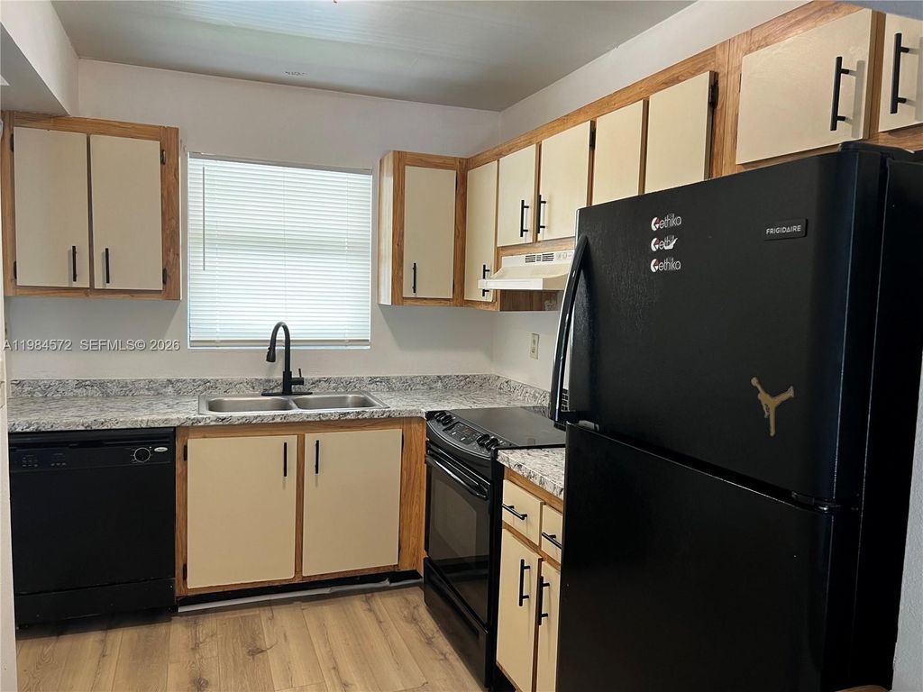 Photo of 6001 Shakerwood Cir #204, Tamarac, FL 33319 (MLS # A11984572)