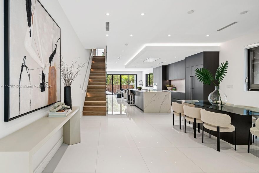 New construction (2022) modern townhome in the heart of Coconut Grove. This 2-story residence (5BR/4.5BA) offers light-filled, open living spaces w/ volume ceilings, high end finishes and fixtures throughout. Stunning, European-style kitchen features Thermador appliances, quartz countertops and cooking island w/seating. All bedrooms offer ample closet space and most have balconies. Luxurious primary suite offers oversized custom walk-in closet and spa-like bath w/soaking tub and glass enclosed rain shower. Enjoy outdoor living with summer kitchen--overlooking the lush Grove tree canopy. Walk or bike to the village’s trendy galleries, boutiques, cafes and experience what Coconut Grove living is all about! Note: Photos are representative but not specific to this unit.